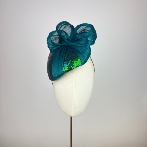 teal and peacock toned shimmer headpiece perfect for a winter wedding or Royal Ascot