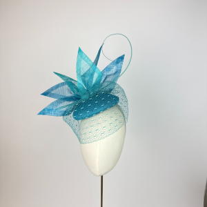Turquoise blue percher headpiece dramatic for ascot or weddings