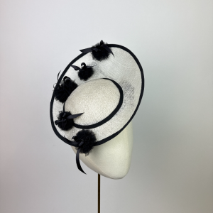 playful pompom monochromw black and white saucer hat perfect for royal ascot