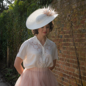 Ivory and blush pink twisted saucer hat, mother of the bride wedding style