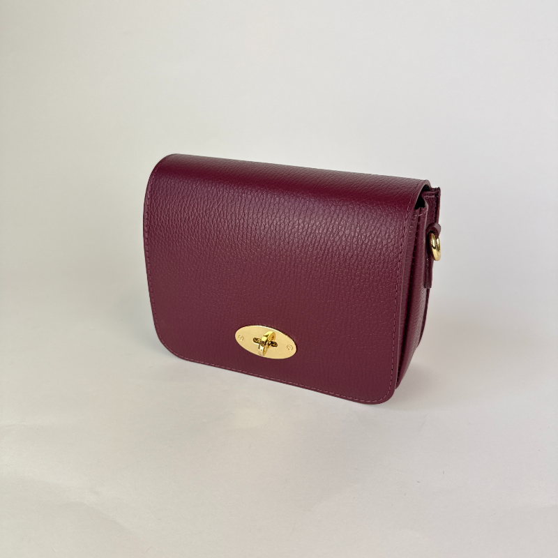cranberry red clutch bag leather