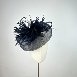 navy bias saucer with feather explosion , wedding guest style